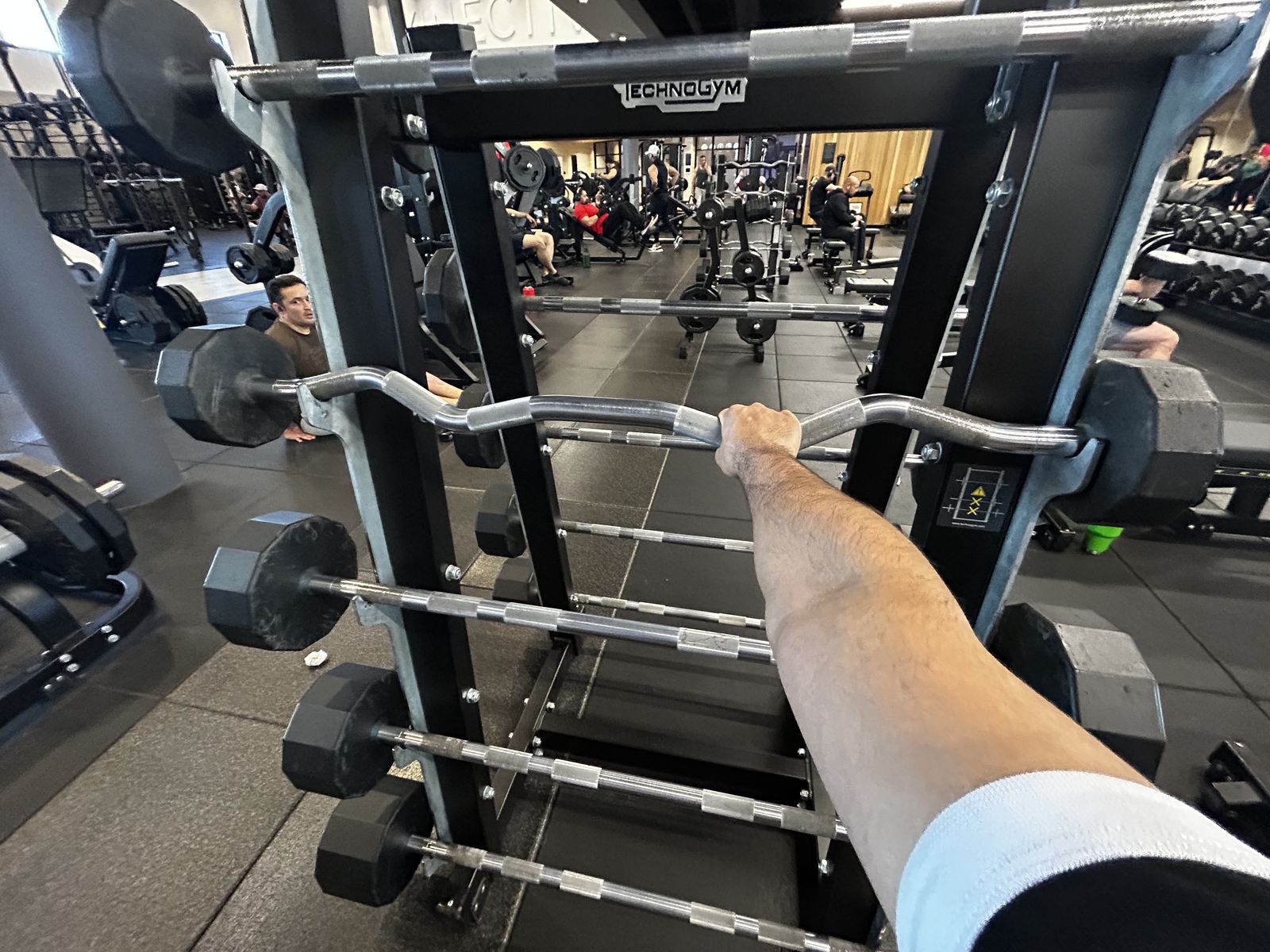 Curl bar on the strength floor